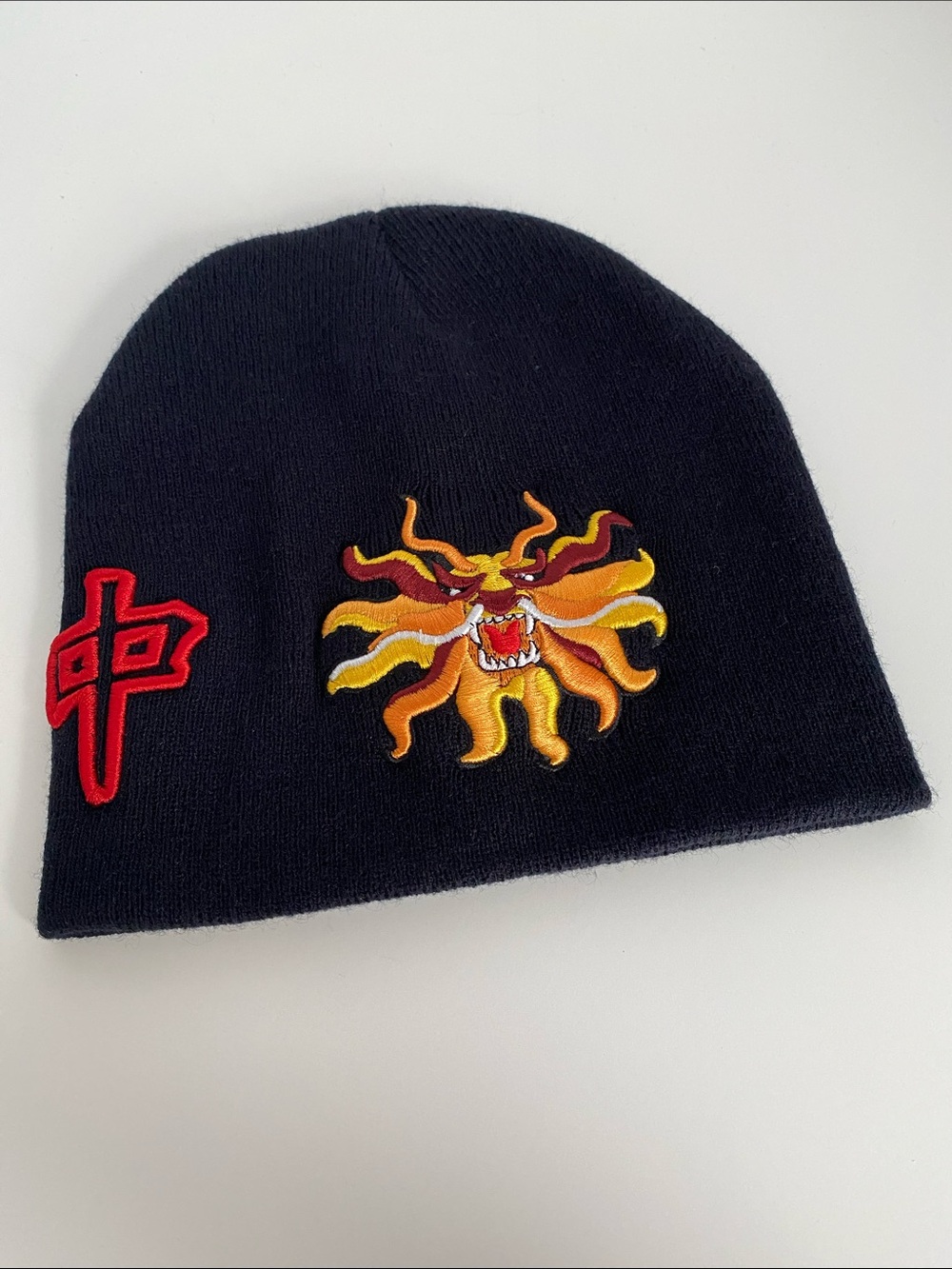 NWOT Black Beanie with Yellow Dragon Patch